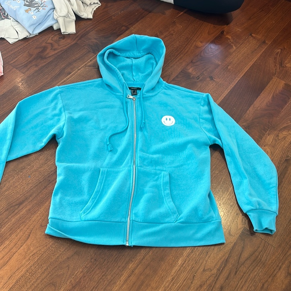 Turquoise zip up hoodie from forever 21 size small.